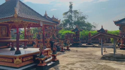 Ornate Shrines in Tropical Outdoor Setting