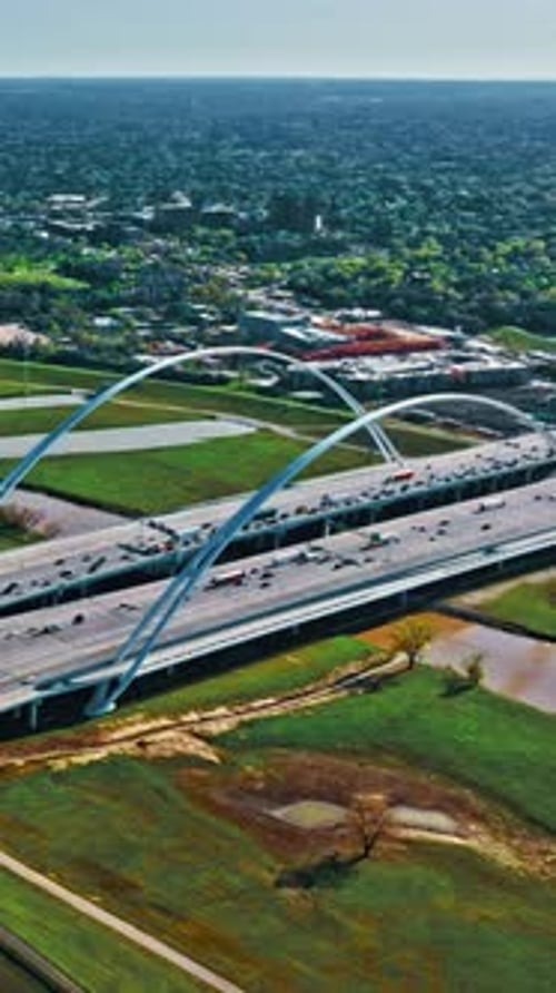 Aerial view of Dallas highway with modern architecture and greenery