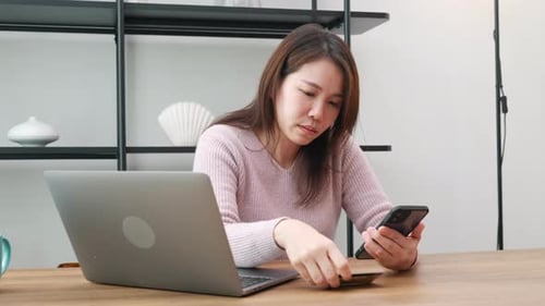 Stressed Female Hold Credit Card Calculating Monthly Home Expenses Income is Money