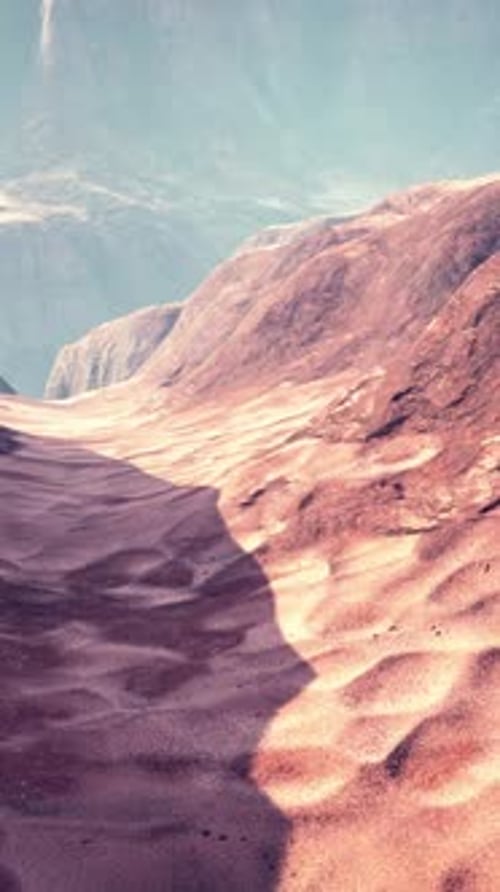 A Majestic Desert Landscape with a Towering Mountain in the Distance