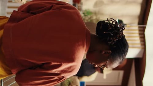 Three Friends Preparing Food Together in Kitchen