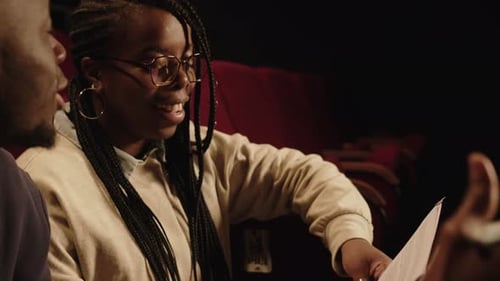 Two Black Theatre Actors Revising Monologue during Rehearsal