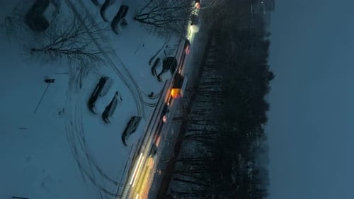 Vertical Timelapse Evening Winter Movement Of Cars In The City