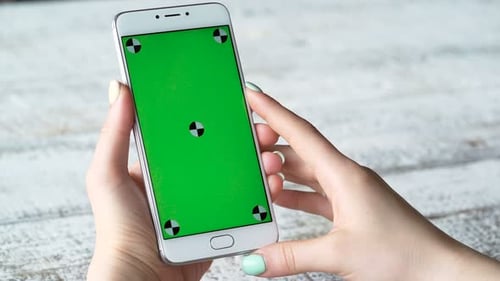 Woman Using Chroma Keyed Phone