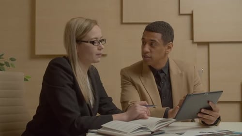 Successful Multiethnic Business Colleagues with Tablet Pc Working at Office