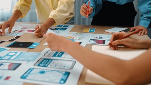 Young Adults Collaborating on UX and UI Design