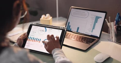 Woman, hands and tablet screen with laptop for analytics, statistics or performance review in home