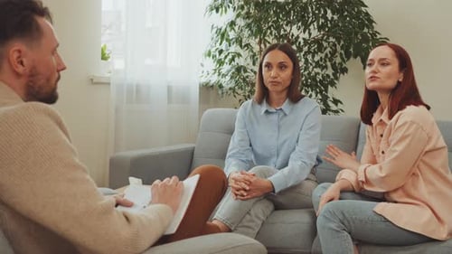Two Women in Therapy Session with Therapist