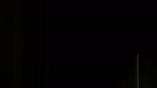 Light Trails Creating Dynamic Swipe Transitions On Black Background