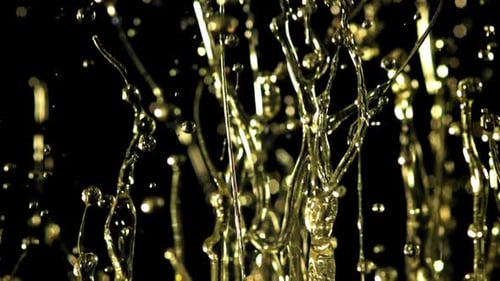 Streams of Golden Fluid on Black