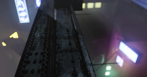 Urban Nightscape Captured From a Unique Angle Showcasing Vibrant Neon Signs