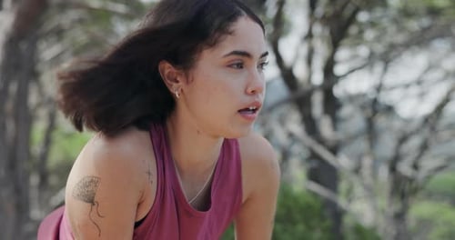 Fitness, watch and wind with woman in nature for adventure, hiking hobby or running fatigue
