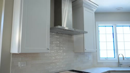 Bright Modern Kitchen with White Cabinets and Sink By Window Professional Kitchen Cabinet