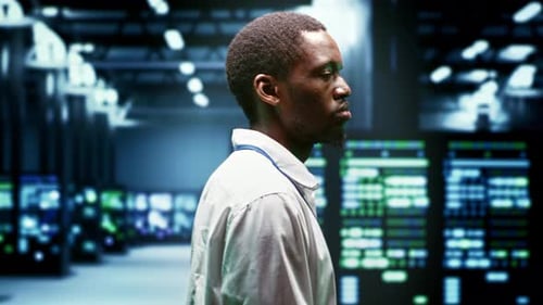 Man Thinks in Data Server Room