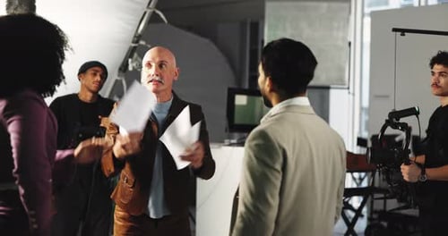 Angry actor, production team and people in studio for problem, poor script or bad writing