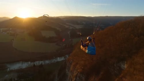 Paragliding Freedom Flying at Peaceful Sunset