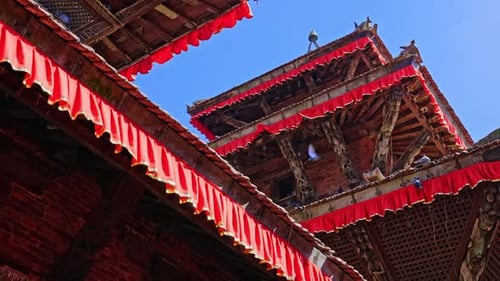 Slow motion of beautiful Multi-Tier Temple's rooftop and blue sky at Durbar Square, Kathmandu, Nepal