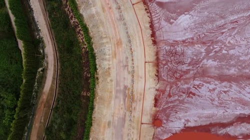 Embalse de Alcoa - Red Mud Pond In Xove, Lugo, Spain. aerial topdown shot