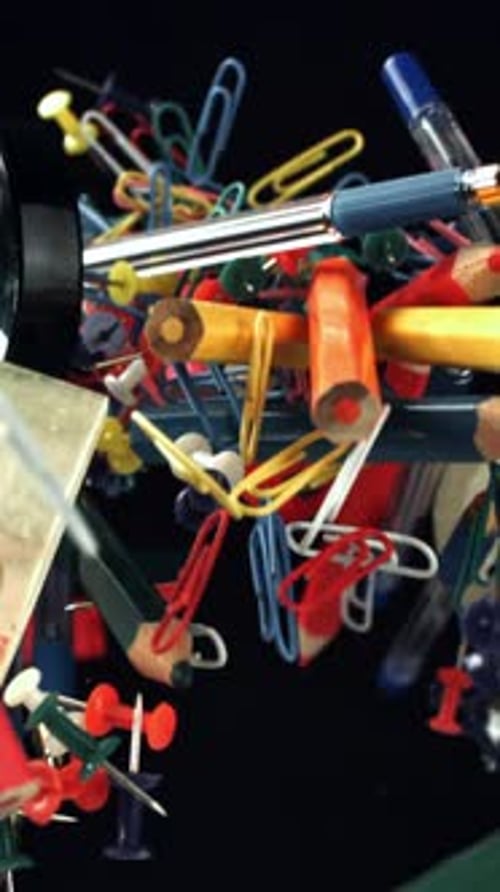 Different School Tools Fly Up and Down Back to School Filmed on a Highspeed Camera at 1000 Fps