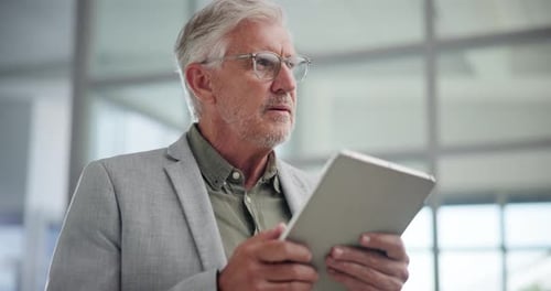 Thinking, mature or businessman on tablet in office for research, corporate schedule