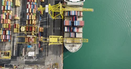 Aerial view of cargo ship and containers, Italy.