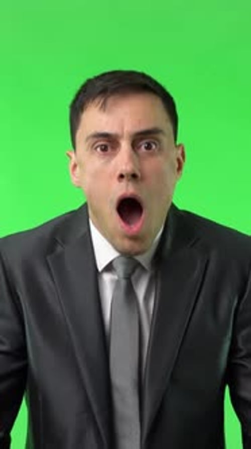 Young Adult Man Looks up in Astonishment