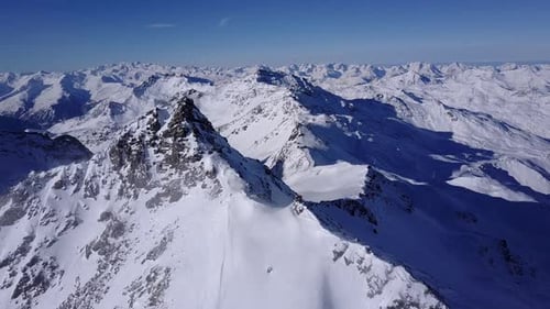 Aerial flight above stunning Alps.