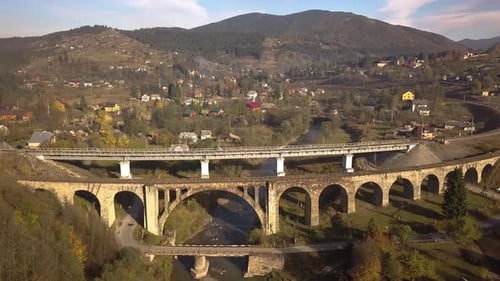 Aerial View of an Old Ruined Train Bridge in Town of Vorokhta in Carpathian Mountains Ukraine
