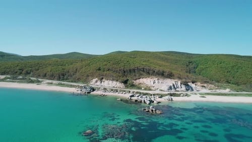 Aerial View of a Beach Turquoise Water and Huge Rocks in the Sea Beautiful Seascape