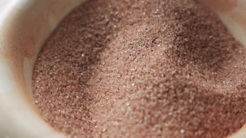 Close up of a mixture of cinnamon and sugar in a bowl