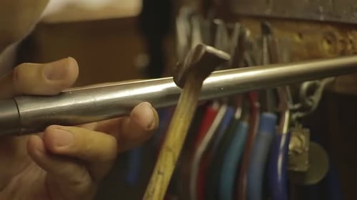 Italian Goldsmith at work building an engagement or a wedding ring.
