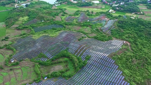Aerial View Of Solar Panels (Solar Cell) With Sunlight. drone Flight Fly