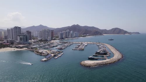 Aerial View Of Marina Internacional In Santa Marta, Colombia. Sunny Clear Day. Orbit Motion Shot