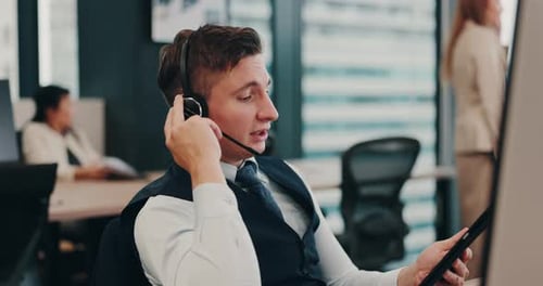 Call center, headset and man on tablet for technical support, customer service or consulting