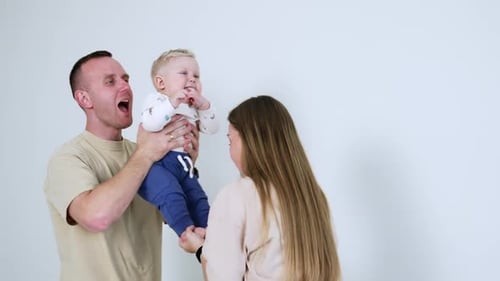 Happy Family Moment with Baby Laughter