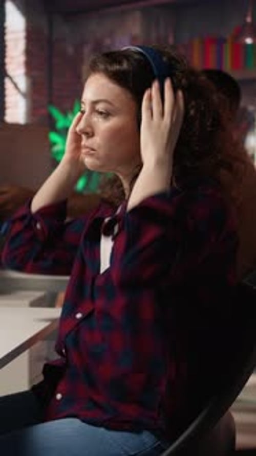 Woman Working on Computer in Modern Workplace
