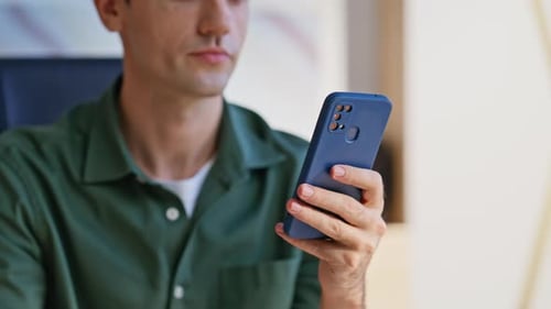 Entrepreneur Looking Cellphone Screen Reading Business Message at Office Closeup