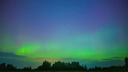 Colorful Northern Lights, Aurora Borealis With Starry Horizon. Timelapse