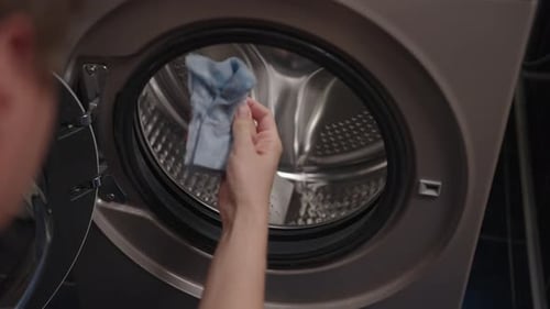Top View of Unrecognizable Housewife Male Using Steam Cleaner Effectively Sanitizing Rubber Seal of