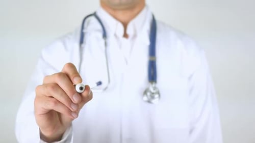Doctor Writing Anxiety with Marker on Glass