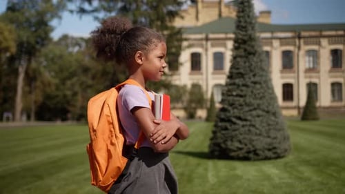 African American Kid Child Little Girl Schoolgirl with Backpack Going School Primary Elementary