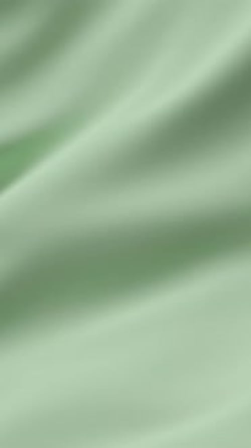 Soft Green Drifting Fabric Flowing Calm Moving Smooth Abstract Curves Forming Minimal Texture