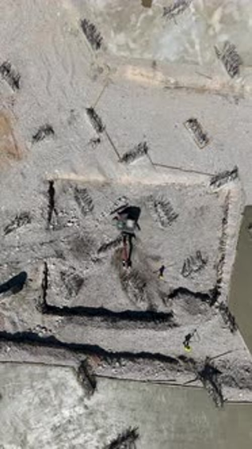 Aerial View of Construction Site Near Water