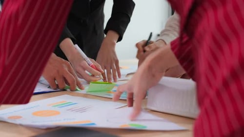 Close up of young businessman and businesswoman people work in office.