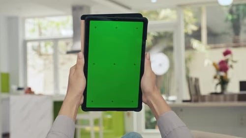 Hands of Woman Holding Digital Tablet with Chroma Key Screen