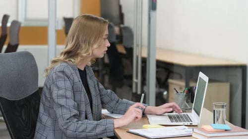 Young Woman Working at Modern Office
