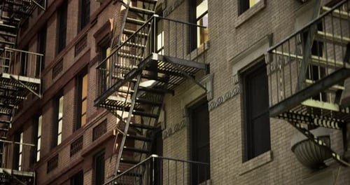 Night City Building Facade with Fire Escapes and Dynamic Lights
