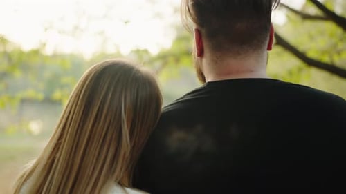 Affectionate Couple Embracing in Beautiful Outdoor Setting