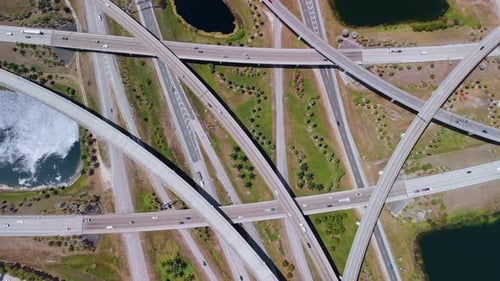 Highway Interchange in Miami City with the Fastmoving Vehicles Showing US Transportation