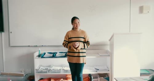 Education, school and a woman teacher in a class for learning, growth or development with a lesson